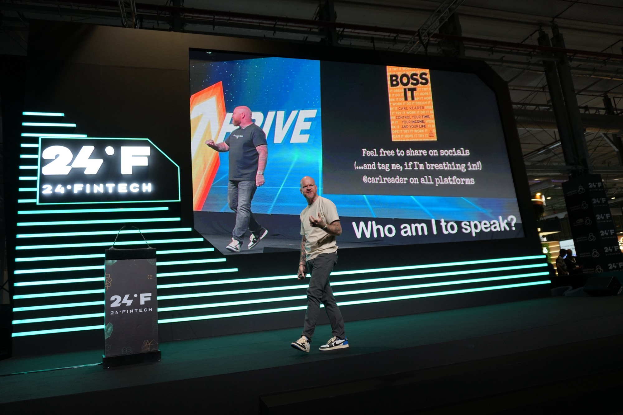 Carl Reader speaking on stage